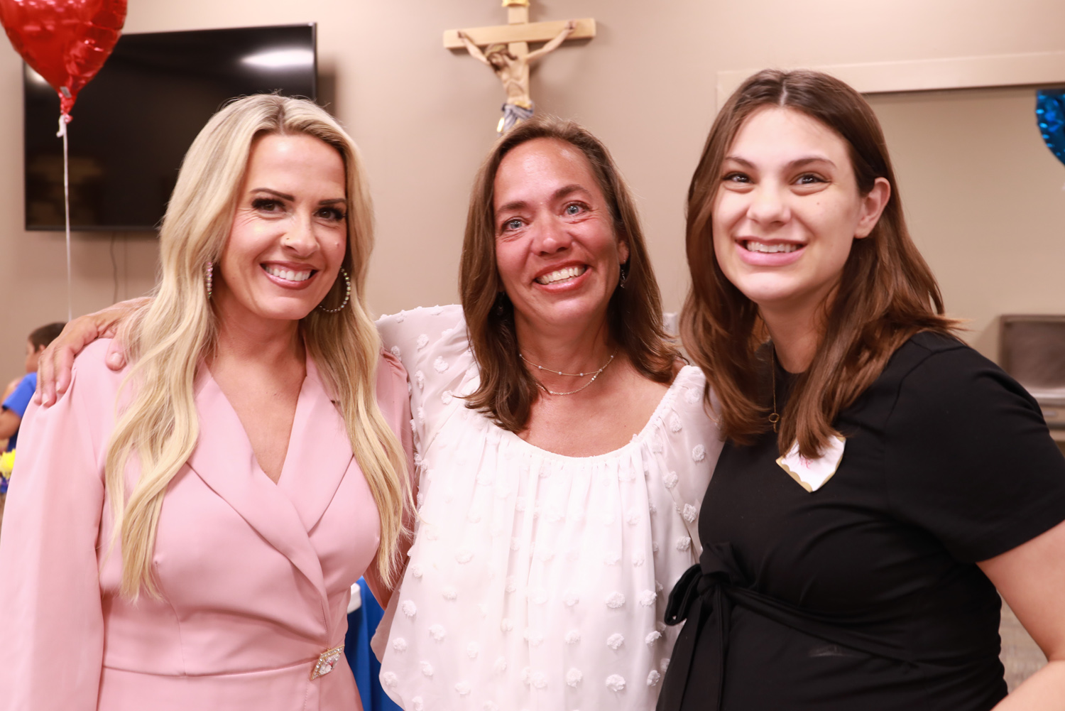 Nikki Schaefer middle others at Heart of a Child gala