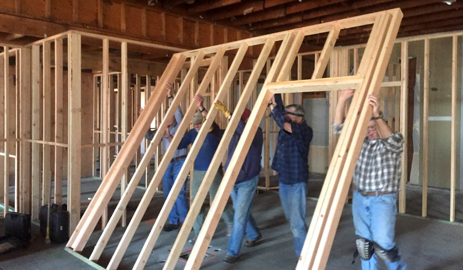 A work crew organized by a pastor who serves as board president framing the inside of Pregnancy Care Center's new location.