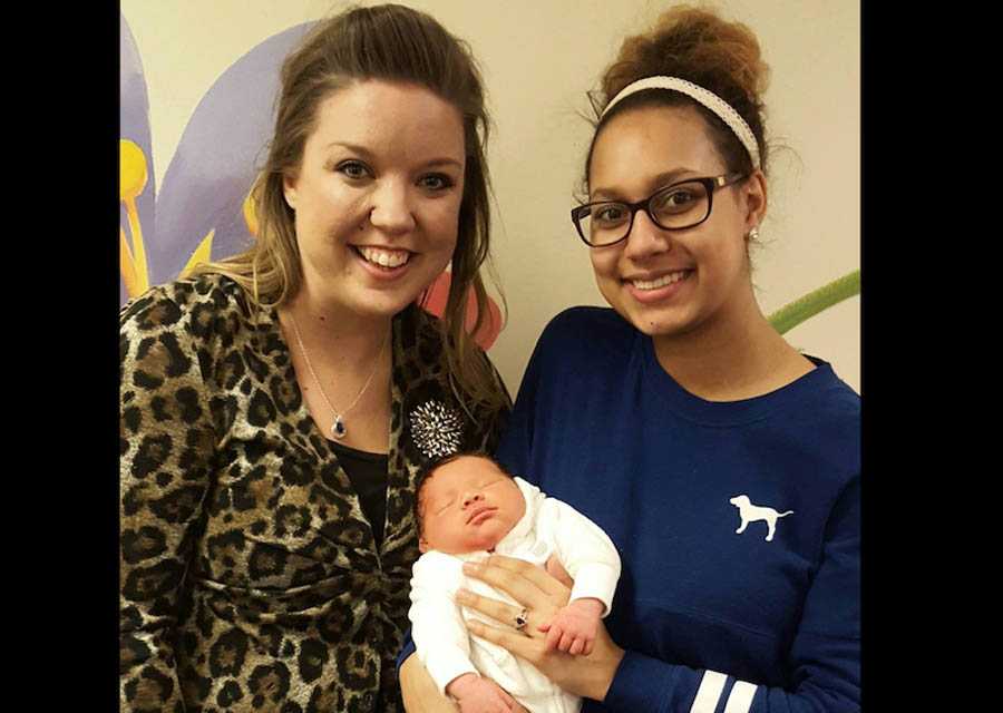 Leeann Beach, Heartbeat of Toledo's Patient Services Director, with Heartbeat client Hannah and her son, Cameron