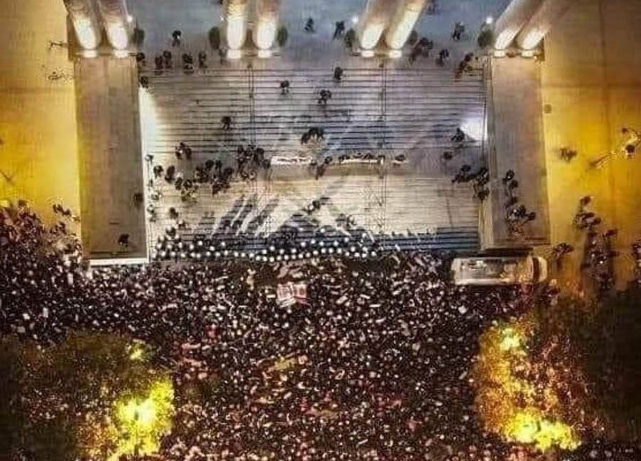A pro-abortion crowd surrounds St Alexander’s Church, where a police line separates the crowd from Polish Catholic’s manning the doors of the church.