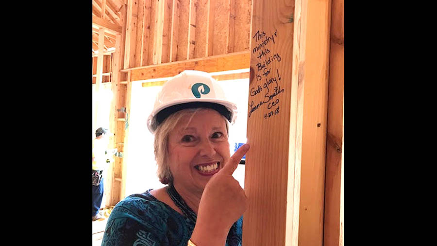 Lenna Smith, CEO of Piedmont Women's Center in Greenville, South Carolina, points to the first words written on the building's walls: "This ministry and this building are for God’s glory."