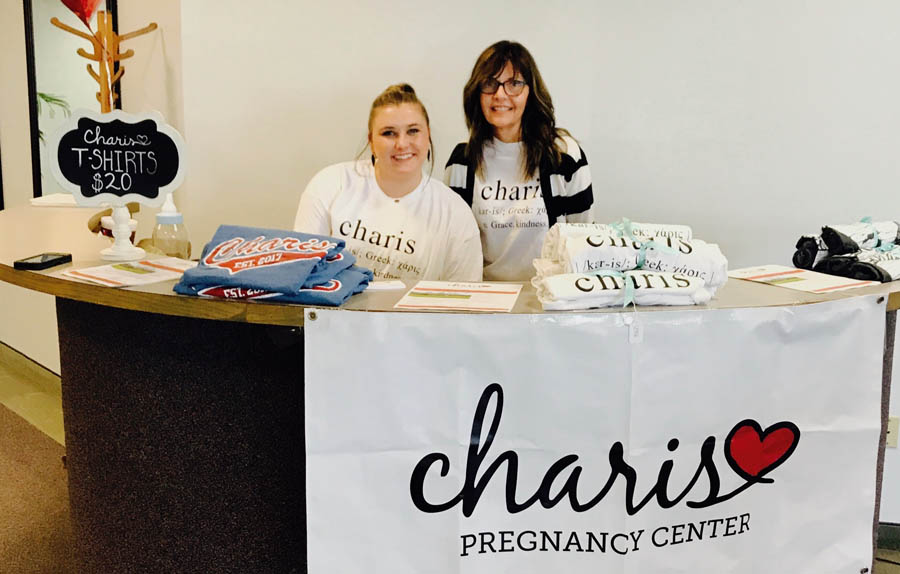 Emalee Williams (left) and Kimberlea Treat raising awareness for Charis Pregnancy Center in late 2017.