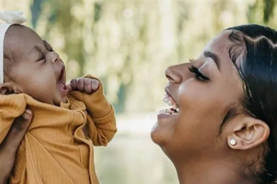 A mother and her baby who were served by one of Pregnancy Care Alliance's member centers.
