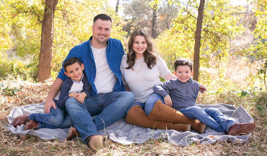 Rebekah Hagan with her husband Kramer and sons Eli on the left and Zechariah on the right. 