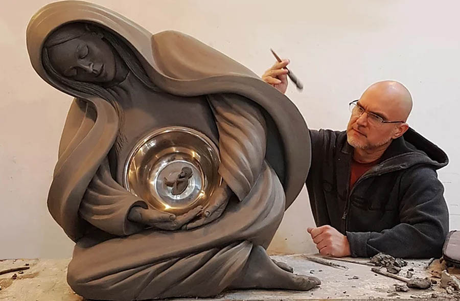 Tim Schmalz at work on the sculpture for the National Life Monument