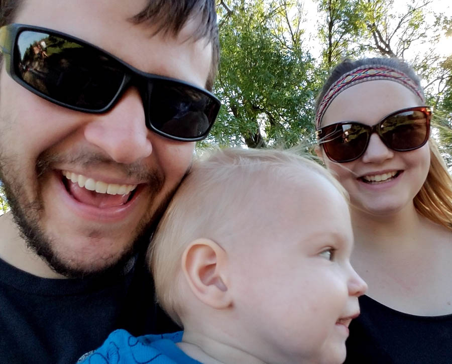 Dan and Brittany with baby Orion, who turns 2 years old in June.