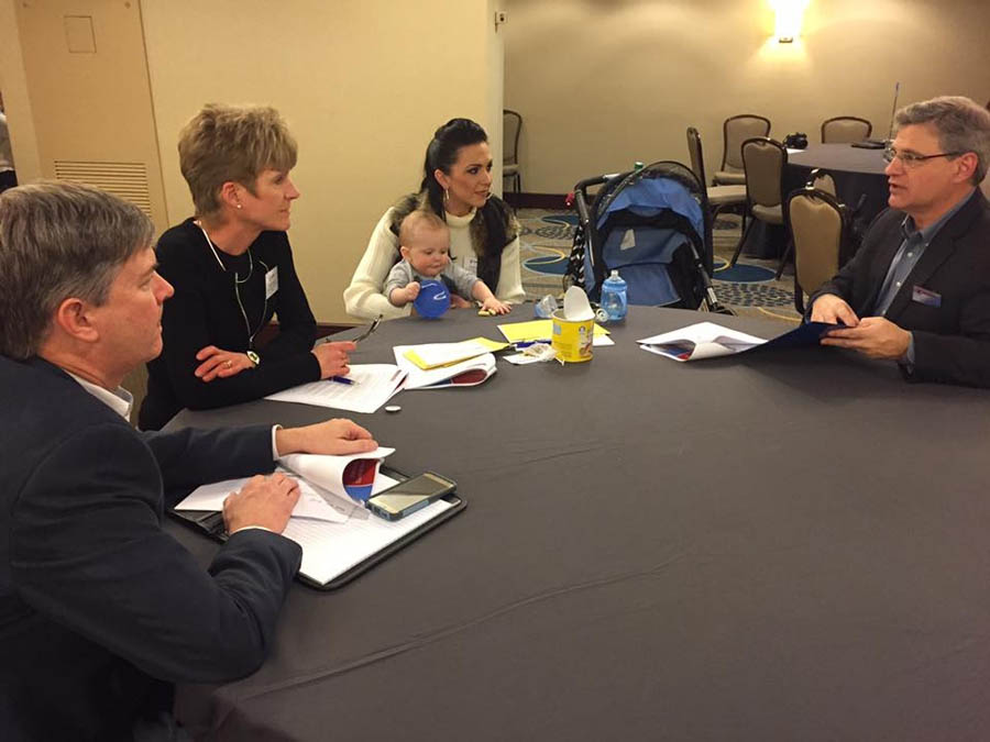 Kirk Walden with Terry Winship, Acacia and Axton, and Heartbeat International president Jor-El Godsey.