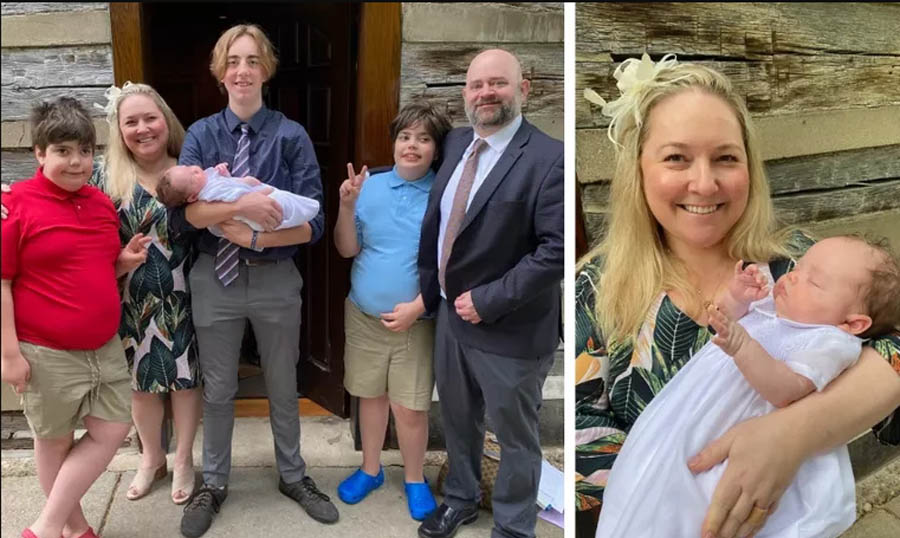 Leigh and Carter Snead pose in a family photo with their four boys. 
