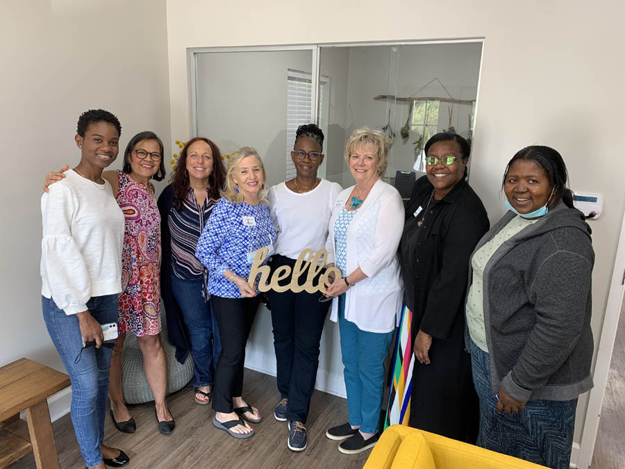 Kamille Martindale, Ellen Foell, Kat Weir, Judy Weber, Harriet Walcott, Leila LeVan, Cindy Ragland, and Iness Simwawa